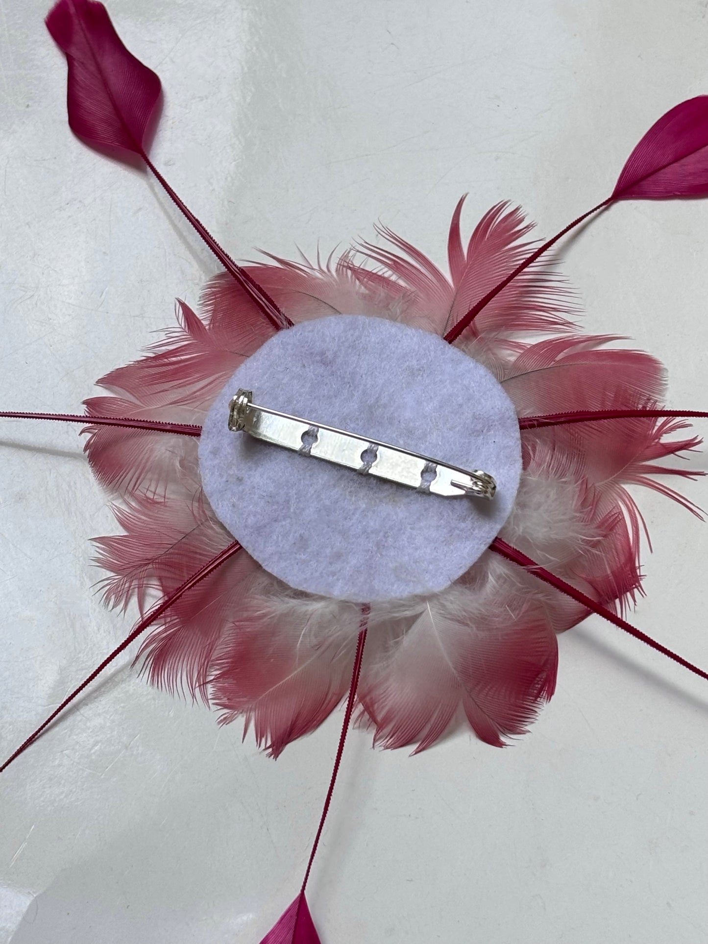 Pink feathers brooch