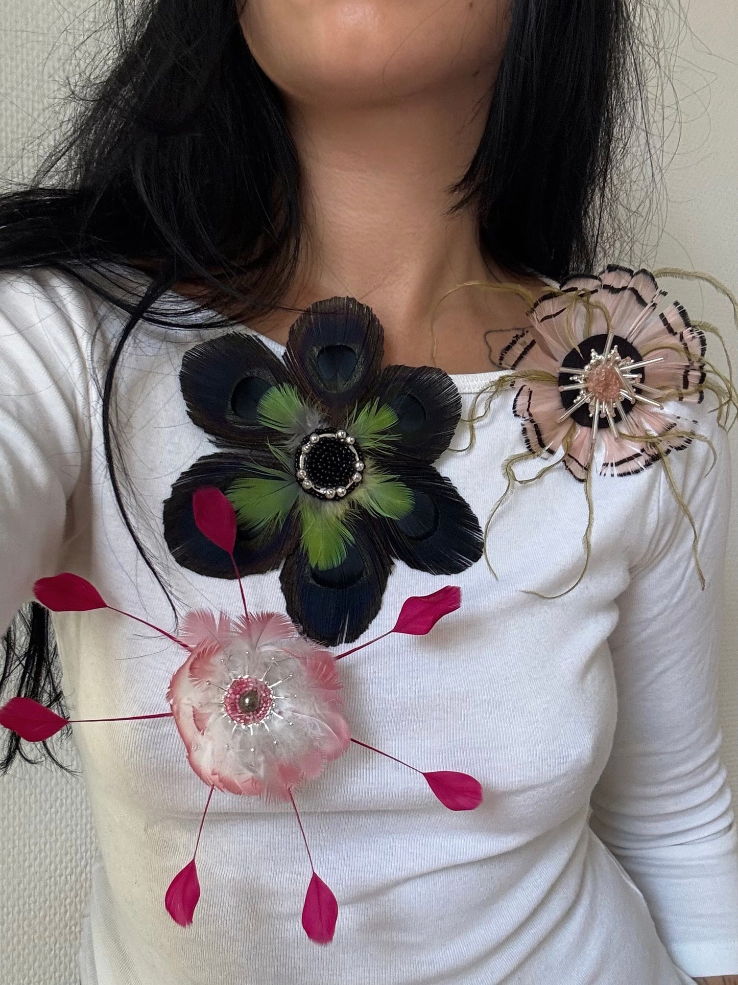 Pink and green feathers brooch