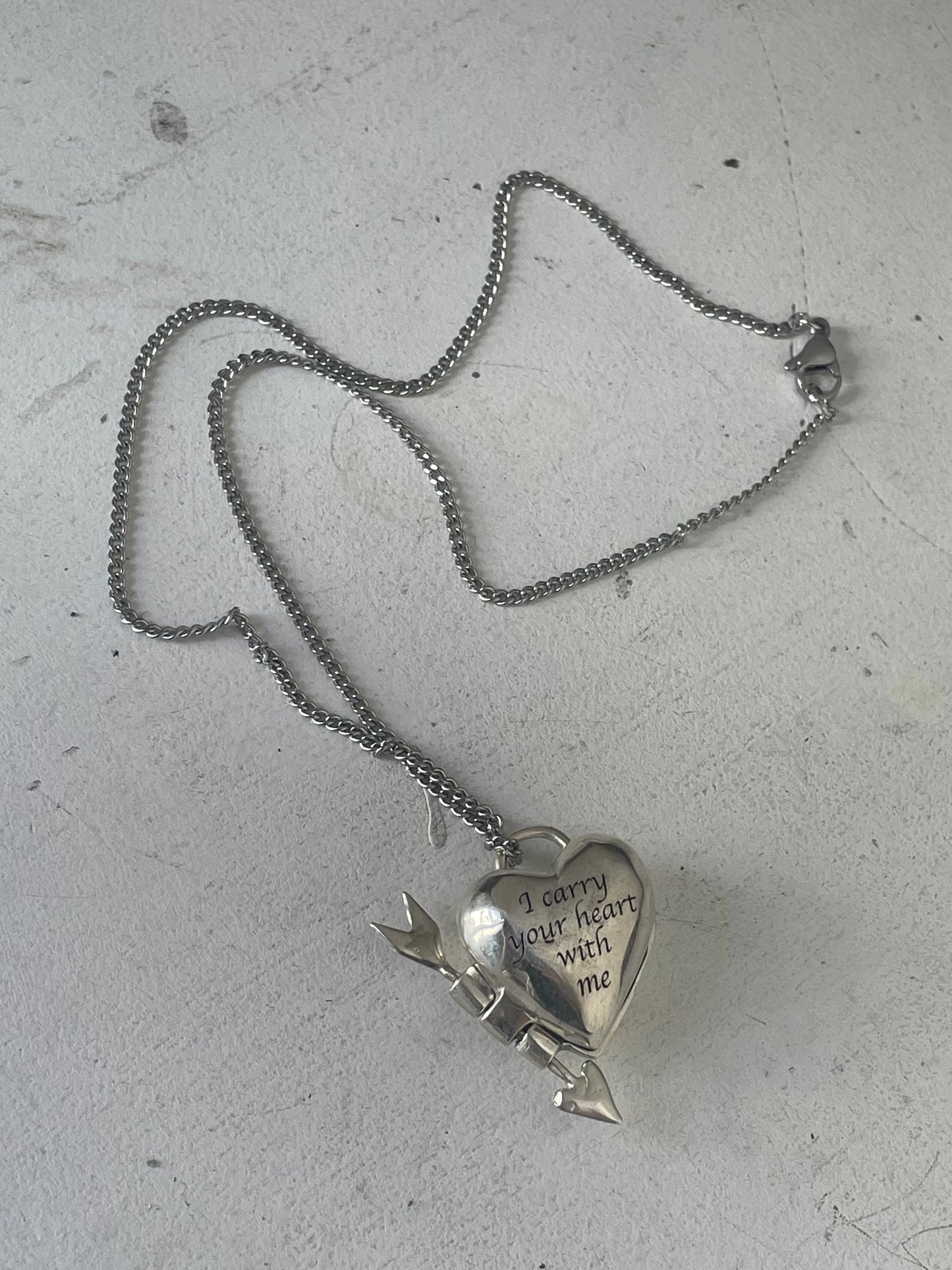 I carry your heart with me