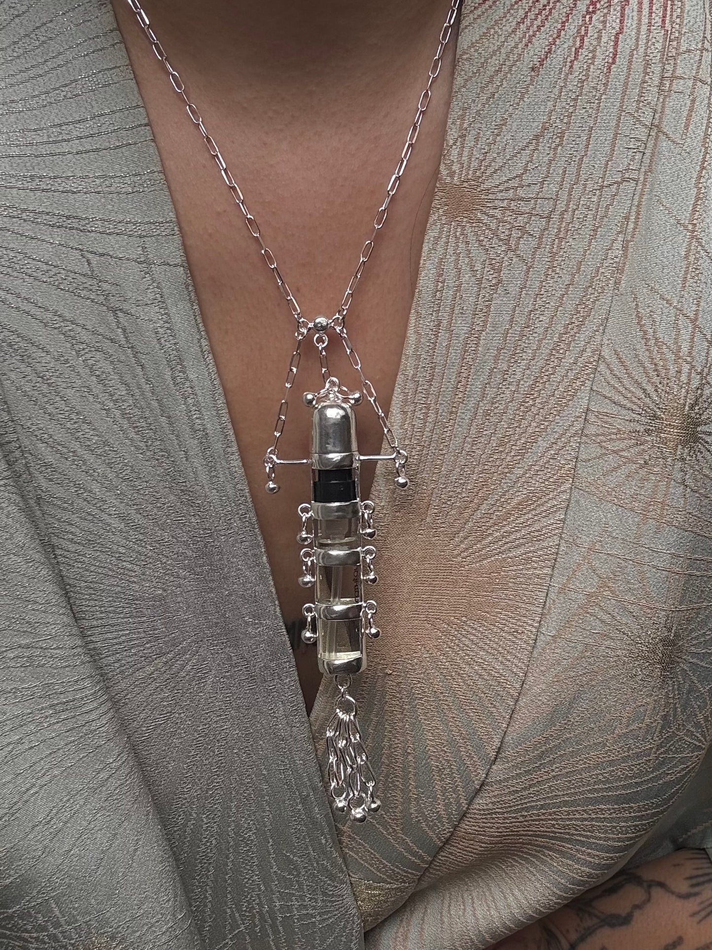 Orpheus perfume pendant